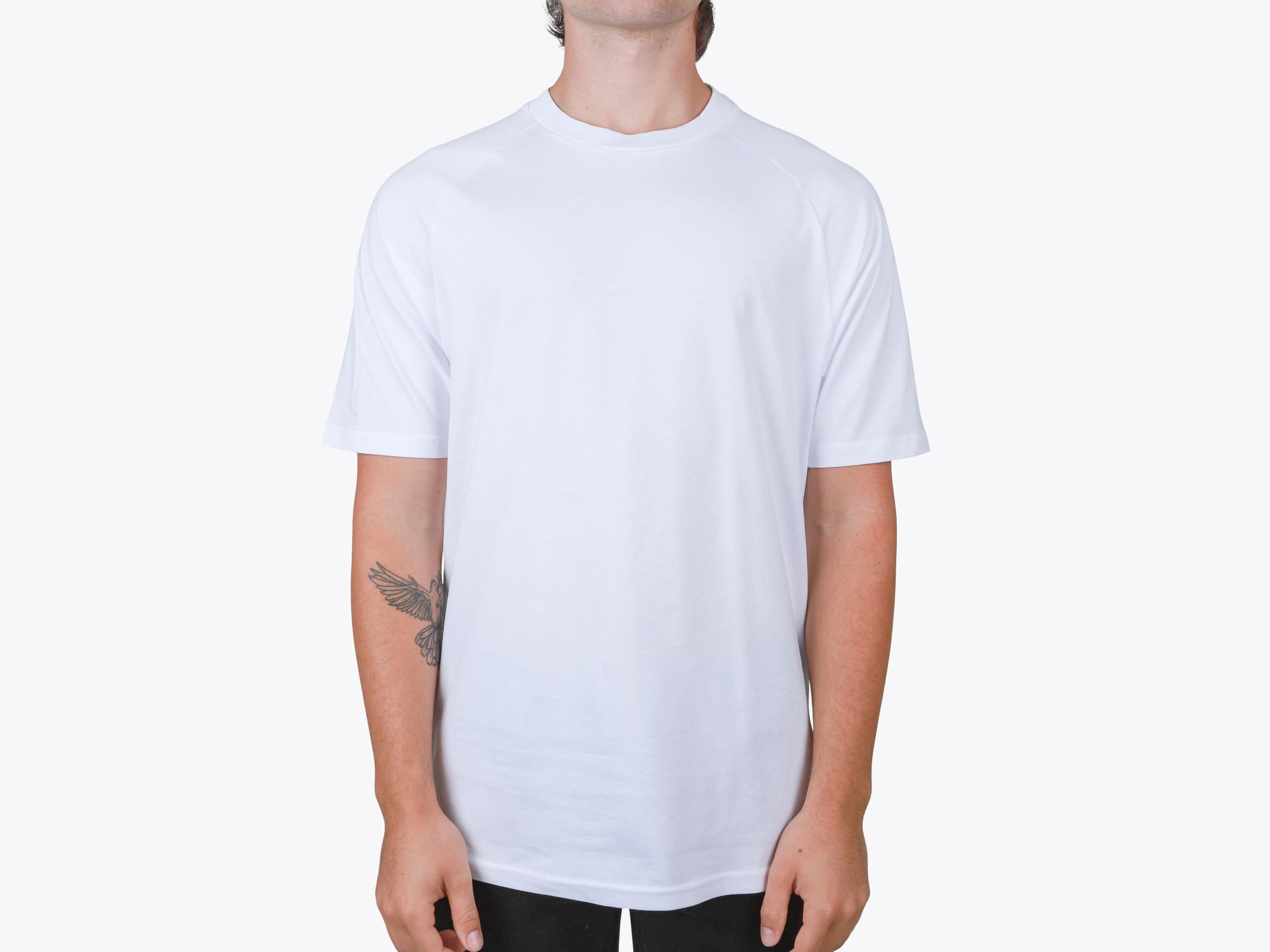 AS Colour 5001R Staple Raglan Tee in White (model:male, size:medium, view:front)