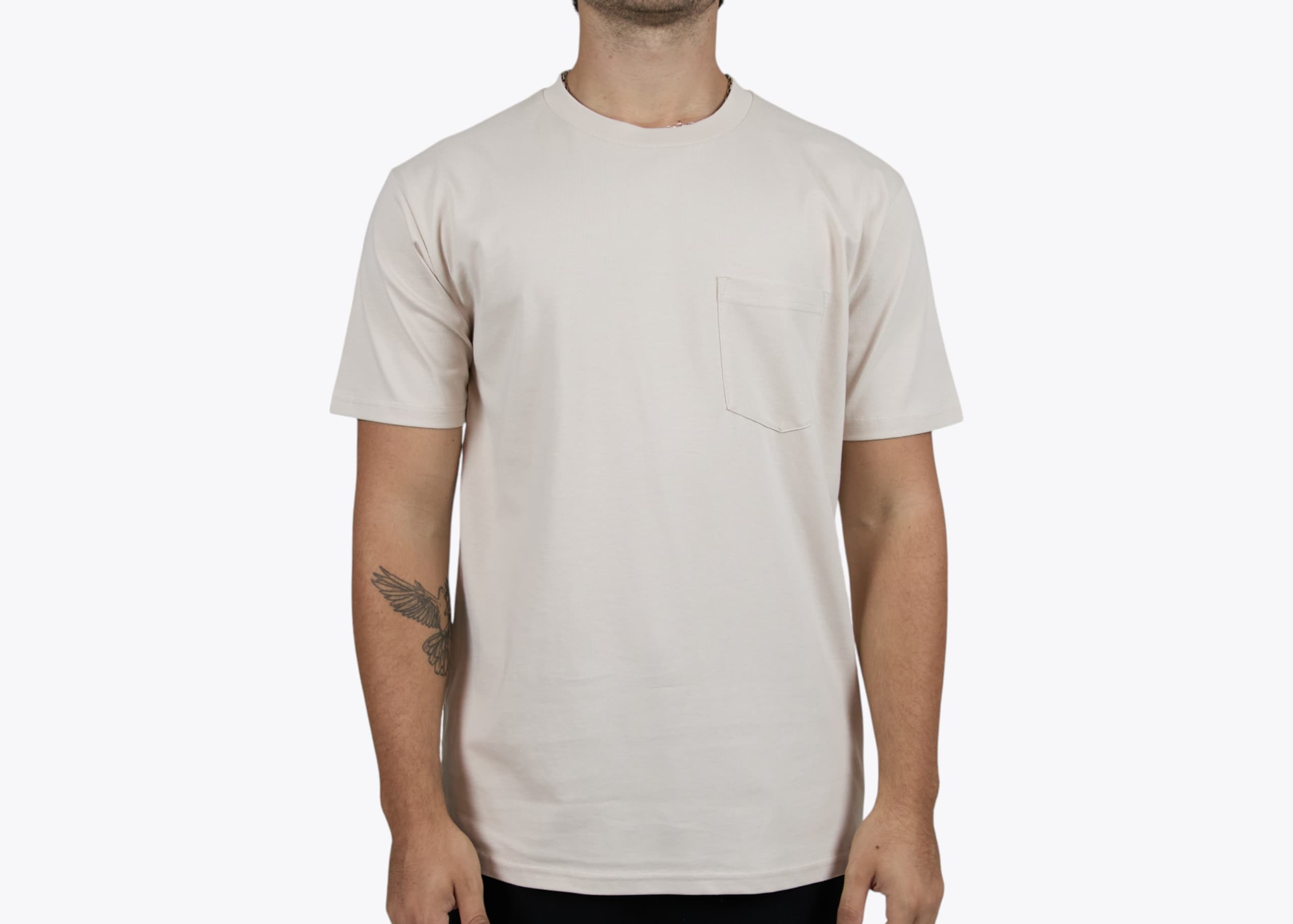 AS Colour 5027 Classic Pocket Tee in Bone (model:male, size:medium, view:front)