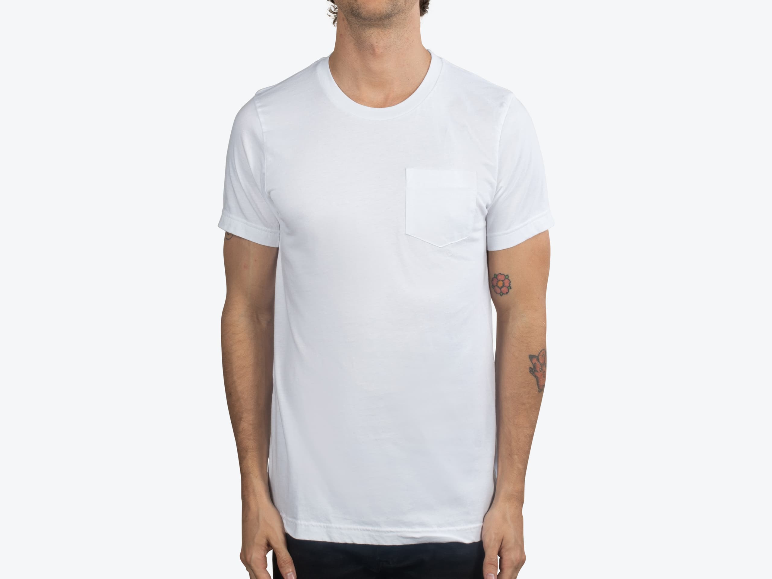 Bella+Canvas 3021 Unisex Jersey Pocket Tee in White (model:male, size:medium, view:front)