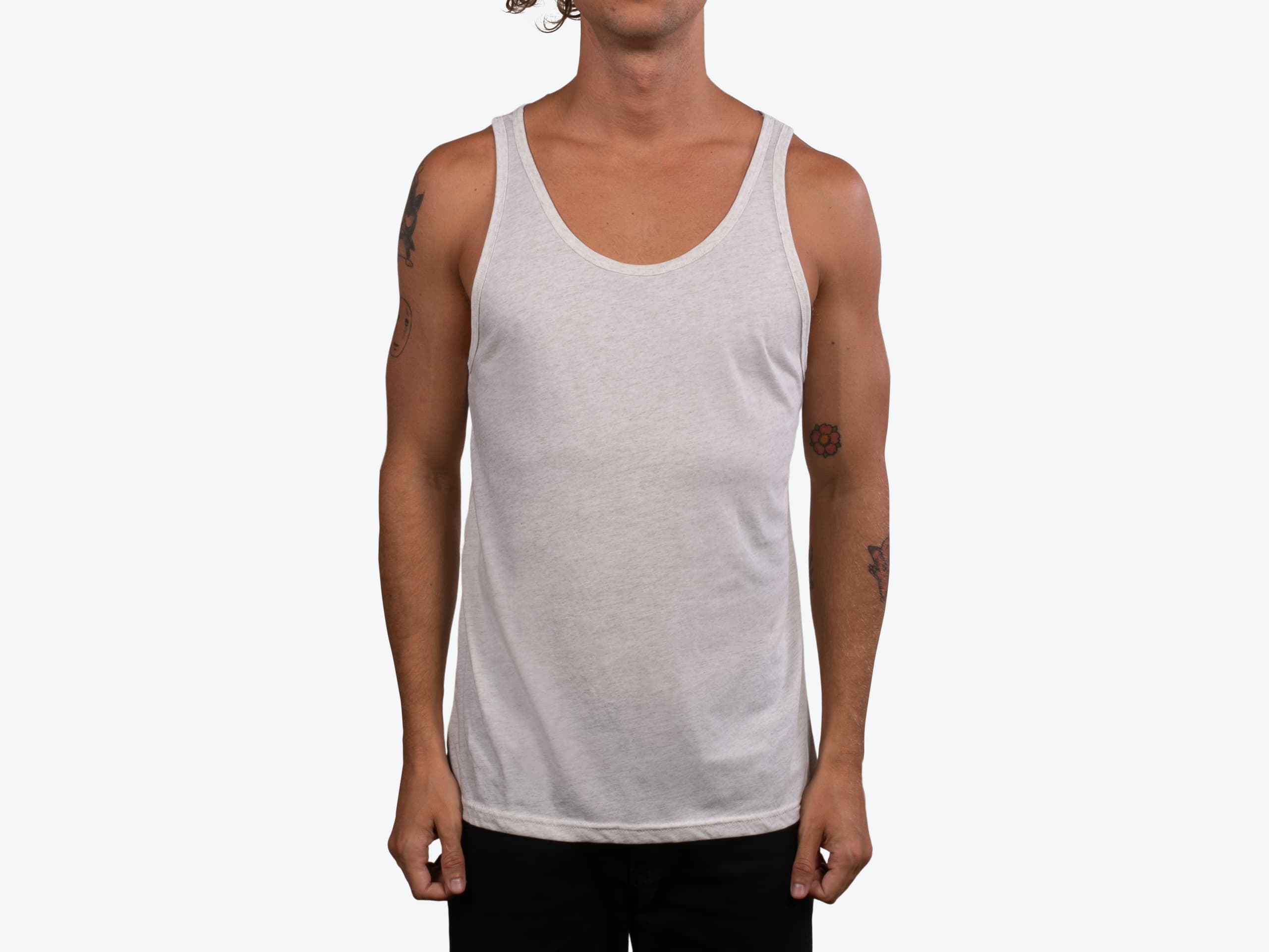 Bella+Canvas 3480 Unisex Jersey Tank in Oatmeal Triblend (model:male, size:medium, view:front)