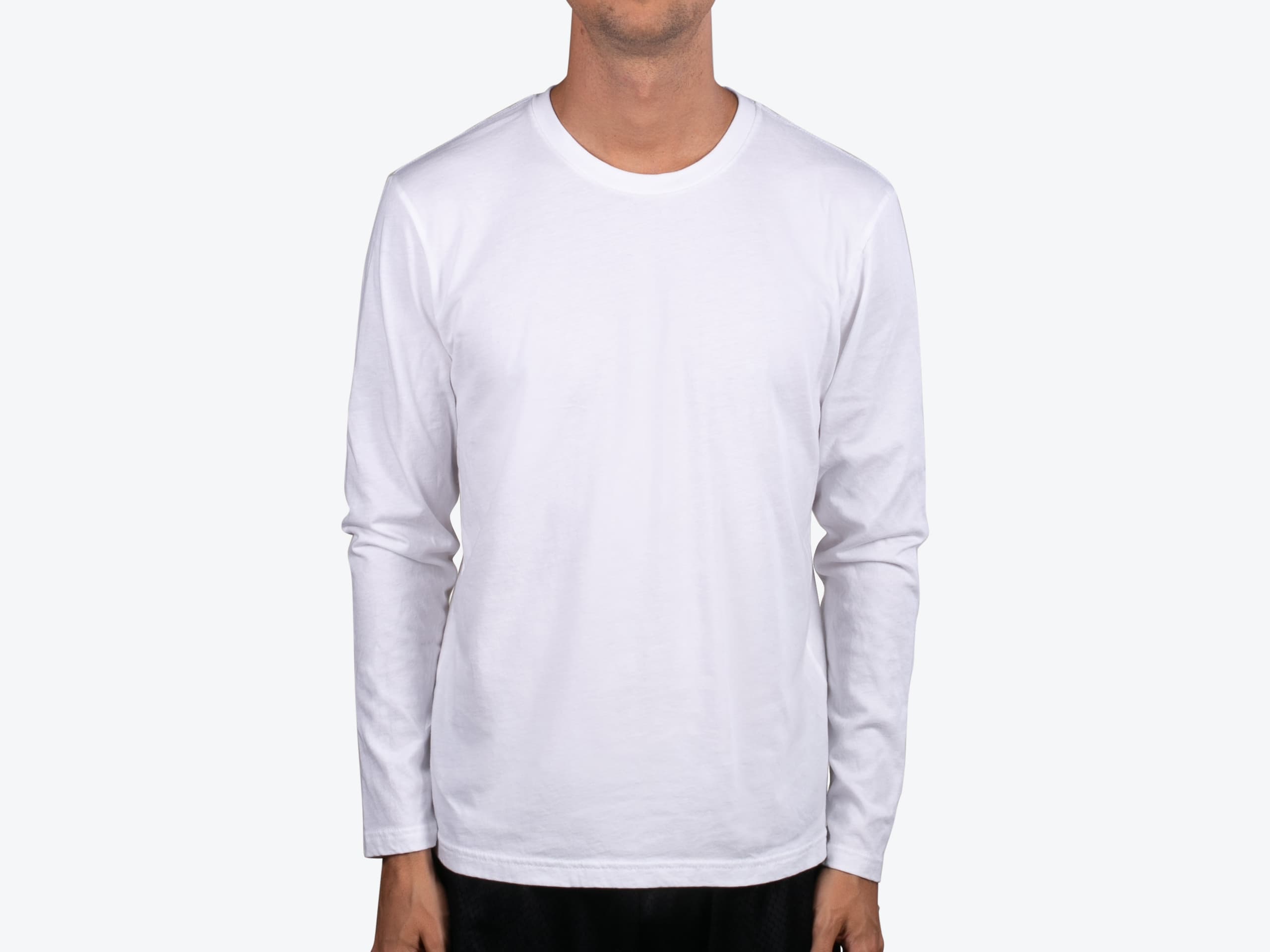 Next Level Apparel 3601 Premium Fitted Long Sleeve Crew in White (model:male, size:medium, view:front)