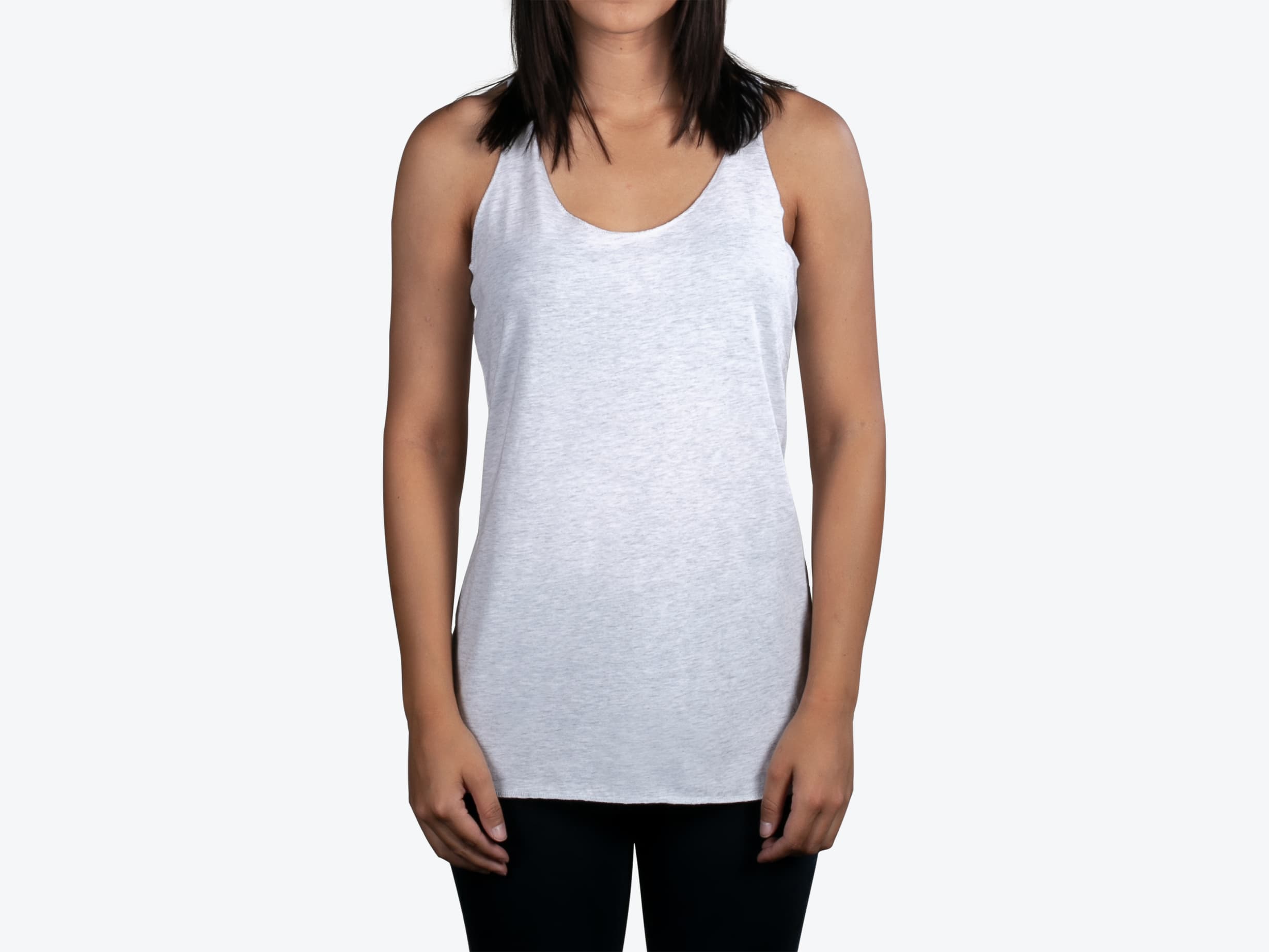 Next Level Apparel 6733 Women's Tri-Blend Racerback Tank in Heather White (model:female, size:small, view:front)