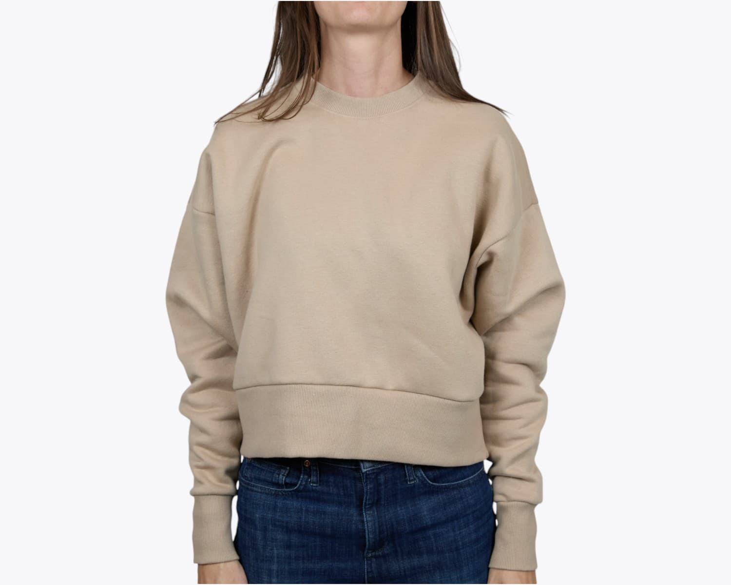 Next Level Apparel 9087 Women's Heavyweight Sweatshirt in Tan (model:female, size:small, view:front)